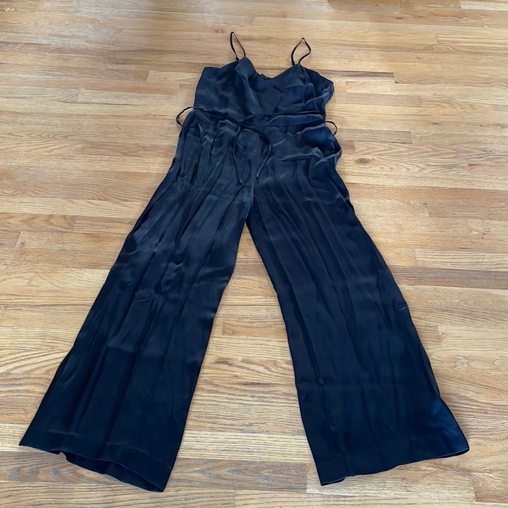 Shiny black romper - size 12. NWT